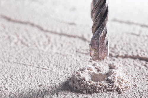 drilling hole into concrete